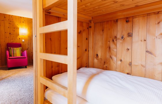 Stockbett aus Holz in der Junior Suite